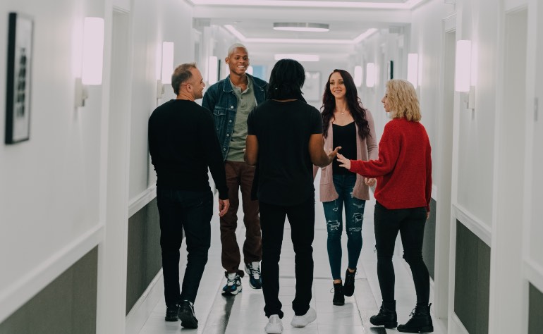 Group in hallway at Evolve Recovery Center Toms River