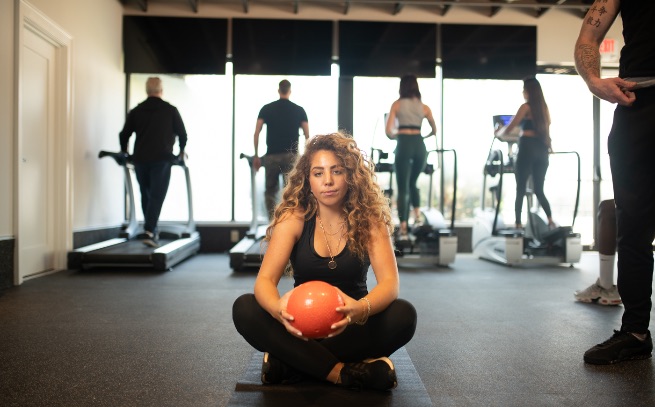 woman at Evolve Toms River gym